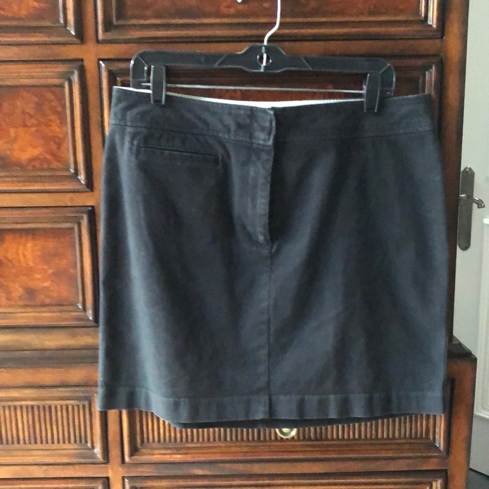 Navy stretch cotton mini skirt.